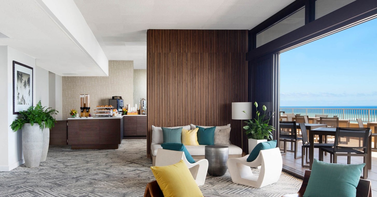 Coconut Club 8 interior tables with views of the ocean