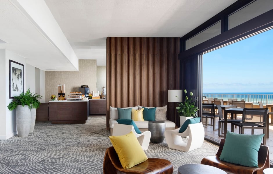 Coconut Club 8 interior tables with views of the ocean