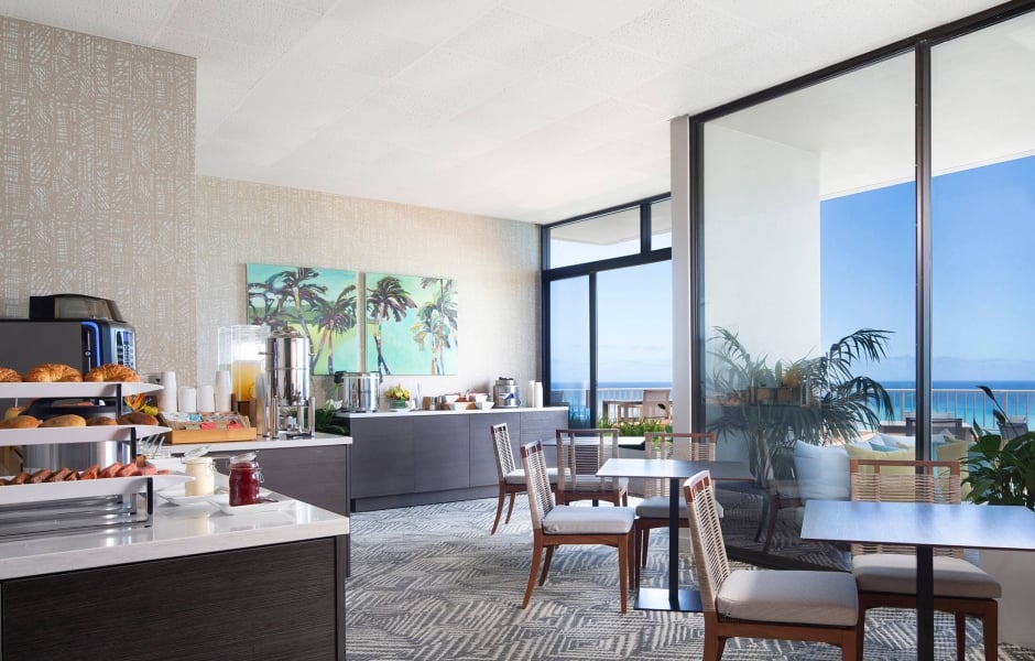 Coconut Club 9 interior tables with views of the ocean