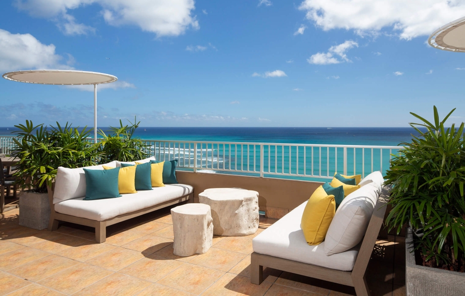 Coconut Club 2 - couches on balcony over looking the ocean