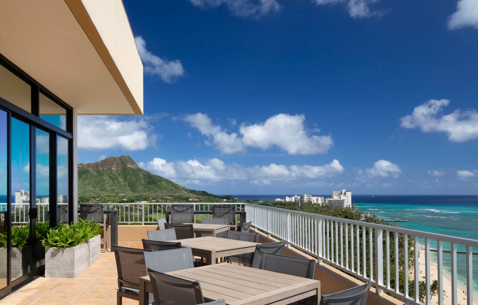 Coconut Club 3 - tables on balcony overlooking the ocean
