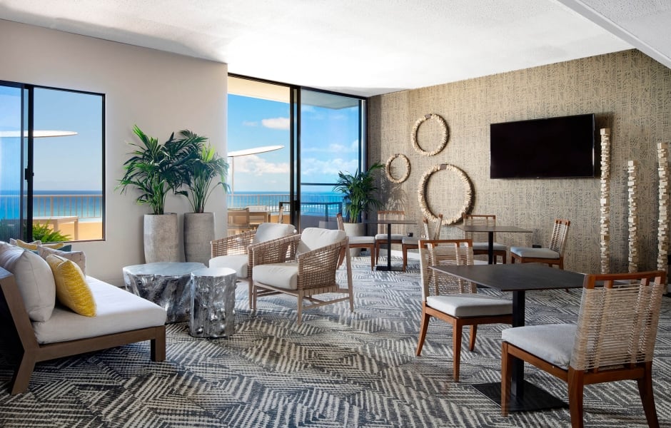 Coconut Club 6 interior tables with views of the ocean