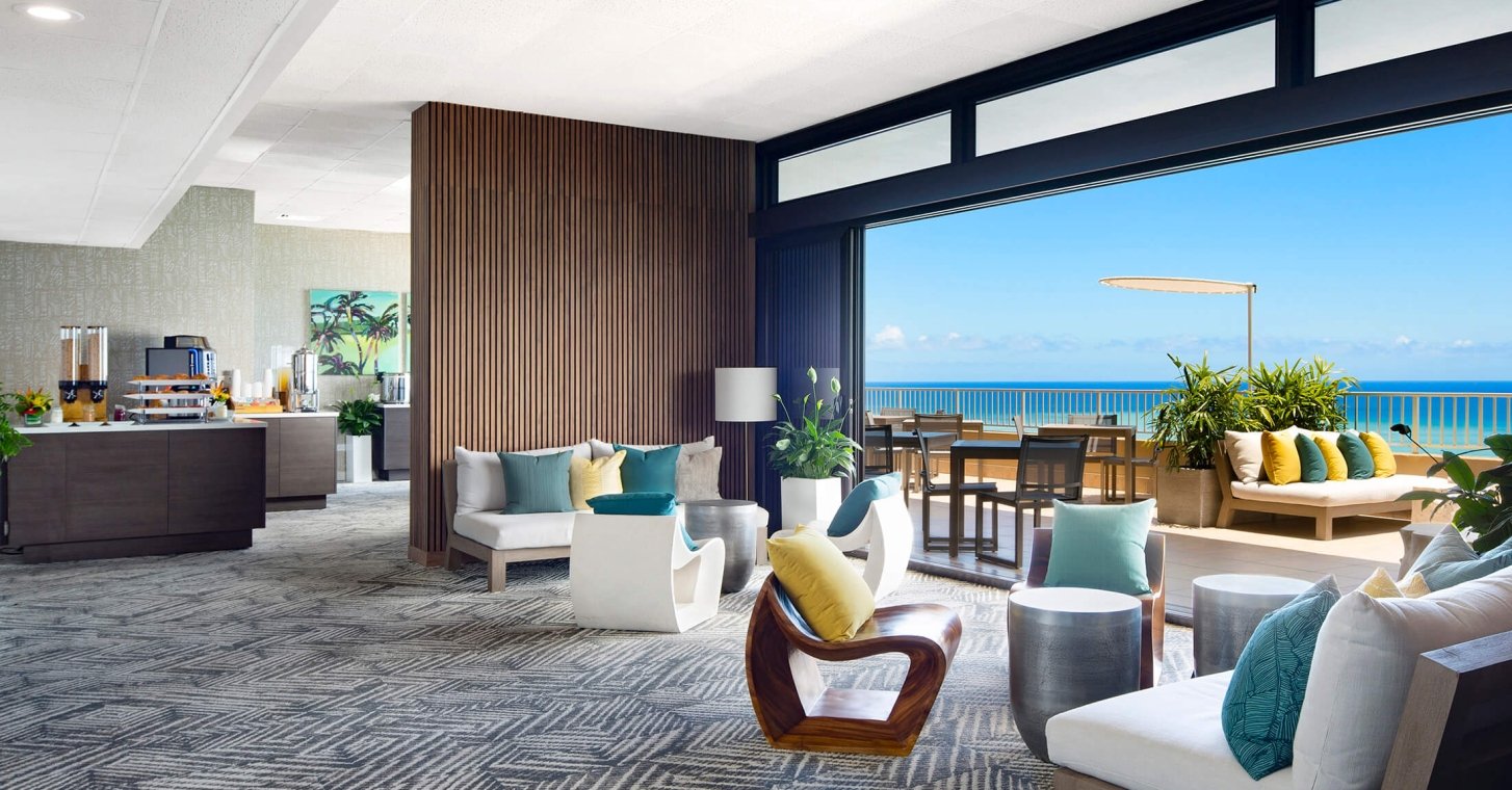 Coconut Club 7 interior tables with views of the ocean