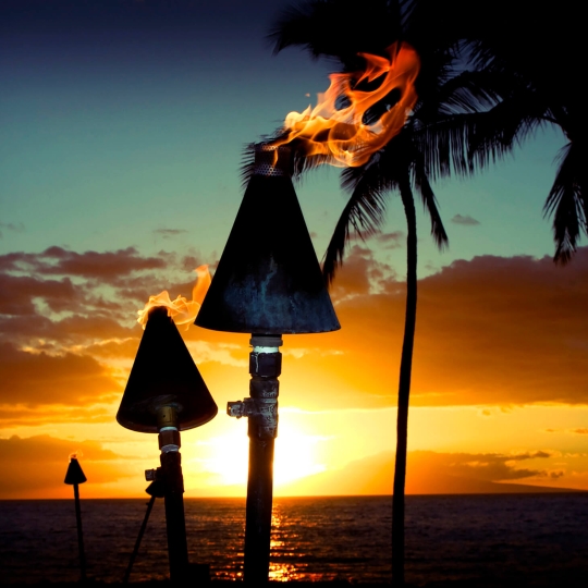 Tiki torches at sunset