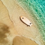 Arial photo of Surfboard on the beach