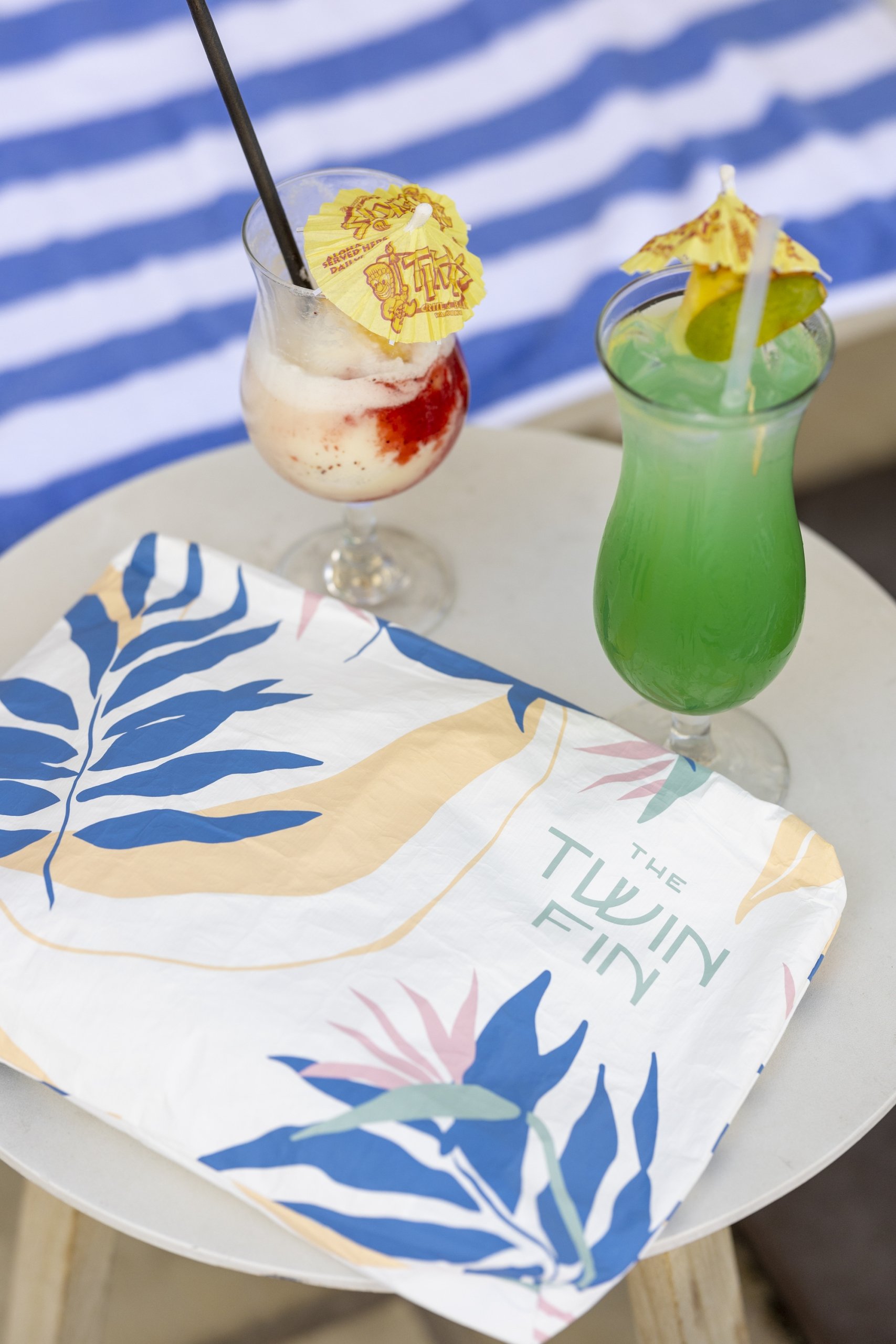 Drinks with cocktail umbrellas