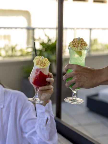 Cocktails with umbrellas mid cheers