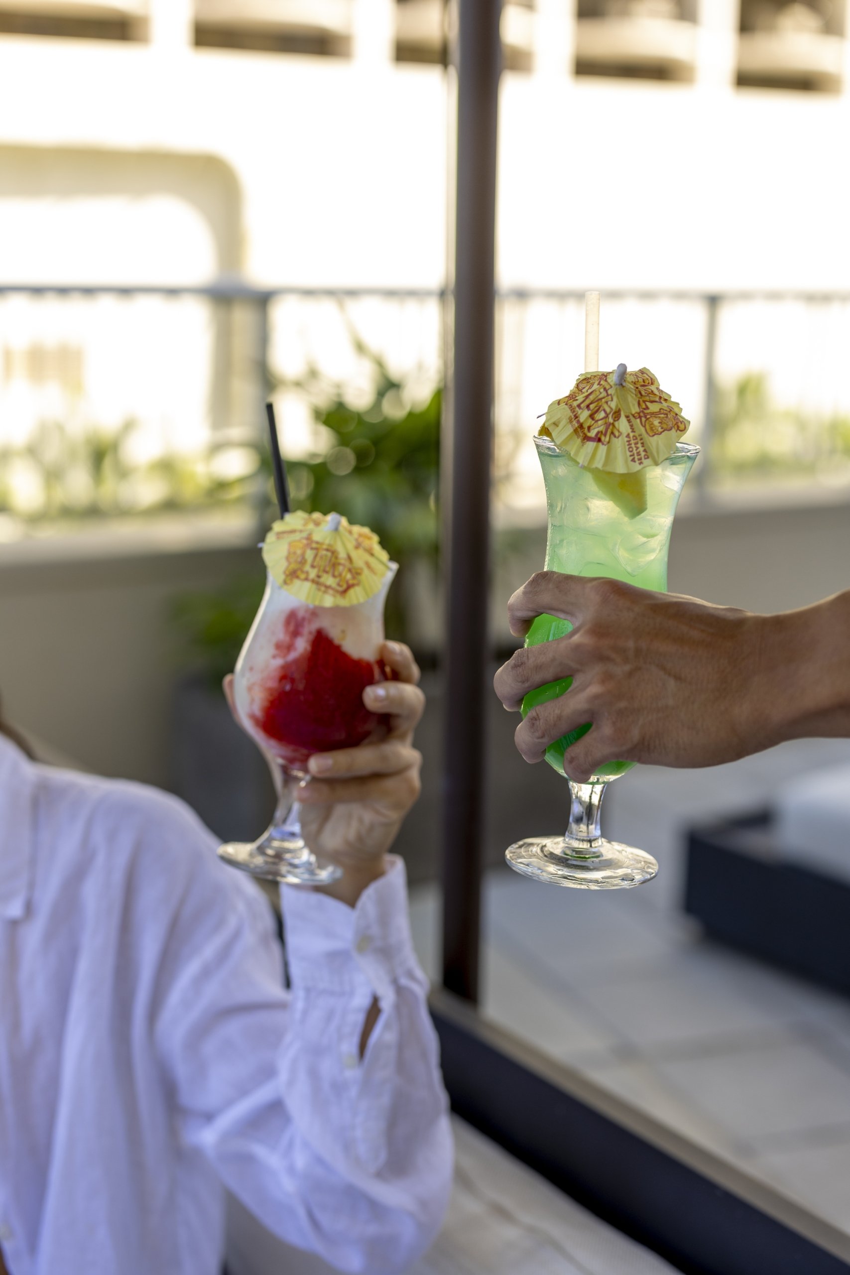 Cocktails with umbrellas mid cheers