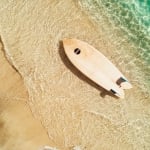 Arial photo of Surfboard on the beach