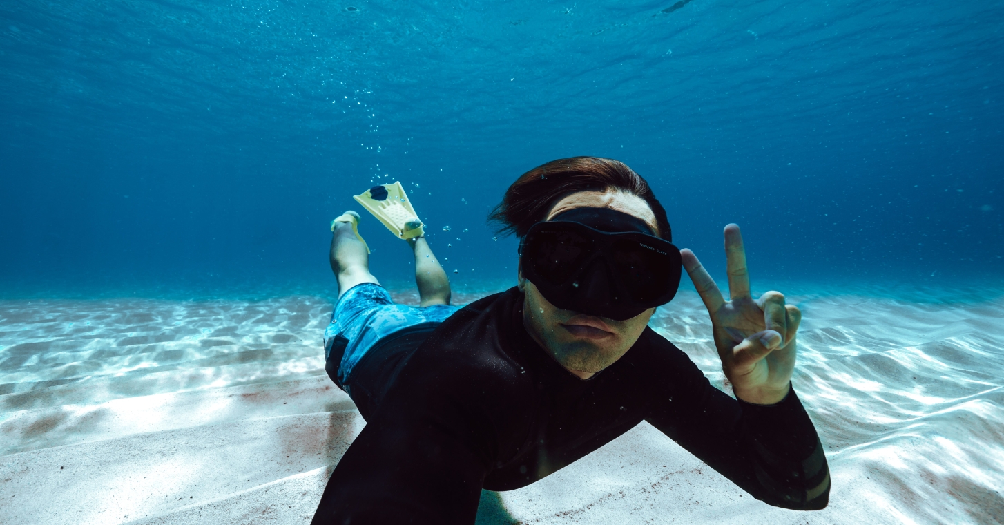 Kammeran Keola scubadiving in the Hawaii's oceans: Kammeran Keola is a surf photographer hailing from the Hawaiian islands