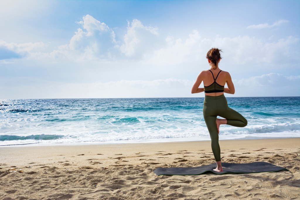 Yoga on the beach at Twin Fin