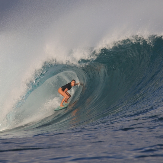 Brittany Penaroza Surfing on Barrel for Twin Fin Hotel