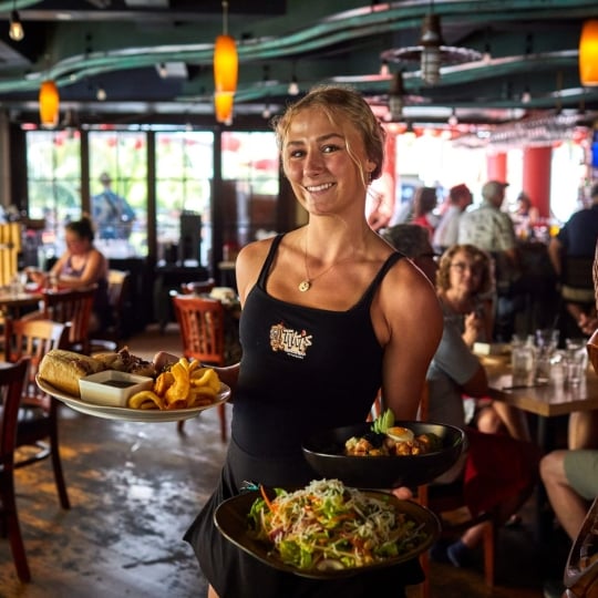 server at tiki's grill & bar