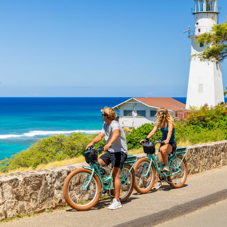 Two people biking